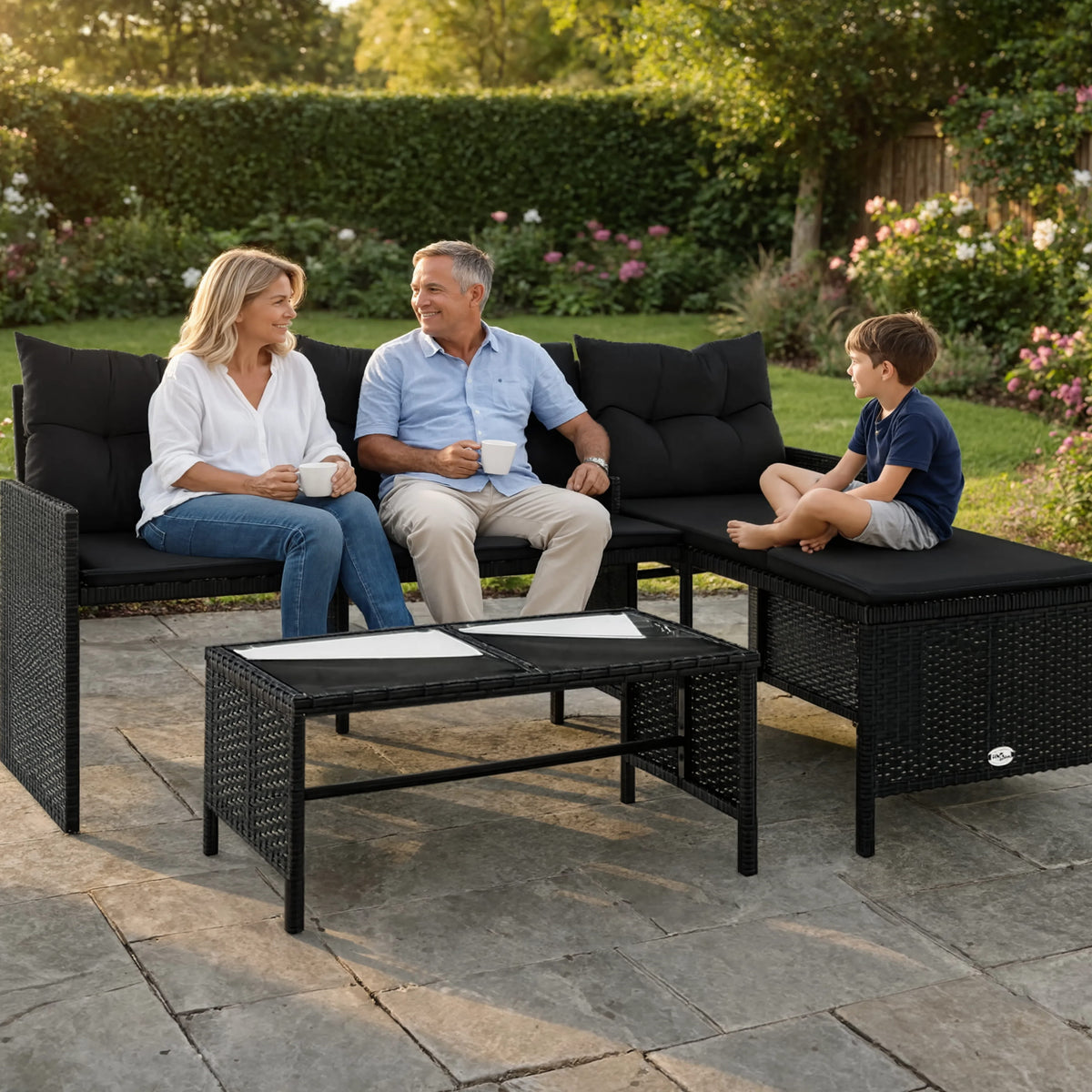 Black PE Rattan L-Shaped Garden Sofa Set with Table & Cushions | GardenCorner